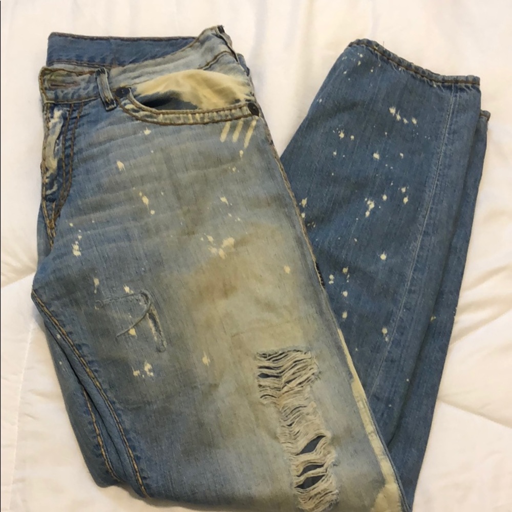 Distressed bleached True Religion jeans